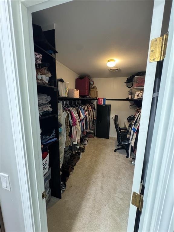 906 S Denman, Chanute, KS 66720 - walk in closet with carpet floors