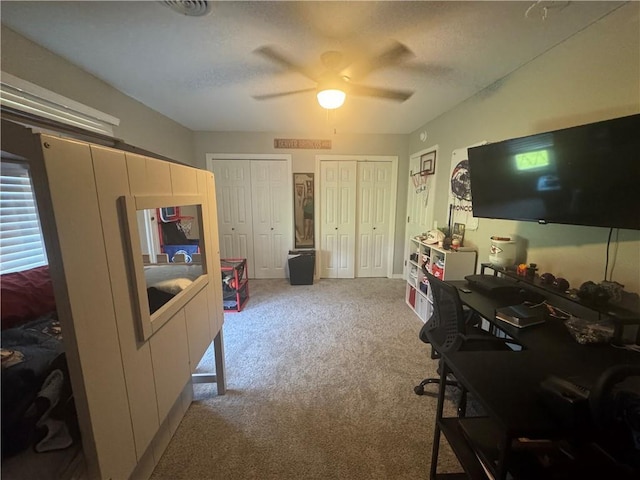 906 S Denman, Chanute, KS 66720 - carpeted office space featuring a ceiling fan and a textured ceiling