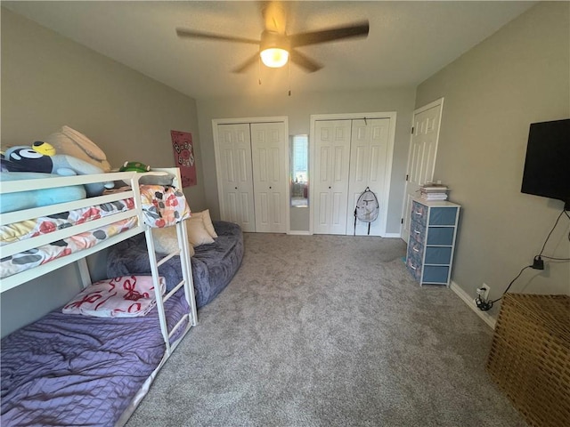 906 S Denman, Chanute, KS 66720 - bedroom featuring two closets, carpet floors, and a ceiling fan