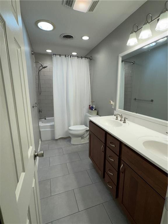 906 S Denman, Chanute, KS 66720 - full bathroom featuring tile patterned flooring, shower / bath combination with curtain, double vanity, and recessed lighting