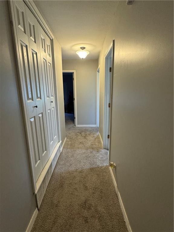 906 S Denman, Chanute, KS 66720 - corridor with carpet flooring and baseboards