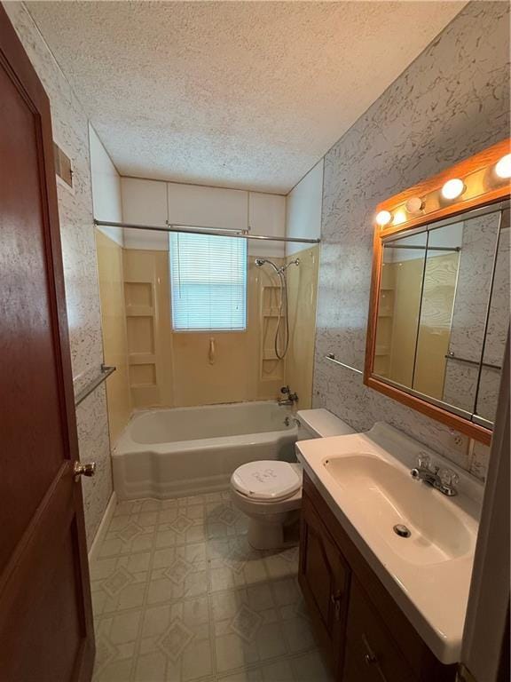 529 S Business Highway 13, Lexington, MO 64067 - bathroom featuring a textured ceiling, bathing tub / shower combination, vanity, and tile patterned floors