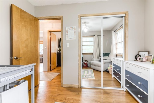 702 Green St, Lees Summit, MO 64063 - bedroom with a closet and light wood-type flooring