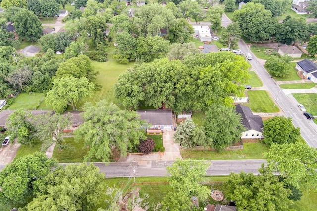 702 Green St, Lees Summit, MO 64063 - view of property location featuring nearby suburban area and a tree filled landscape