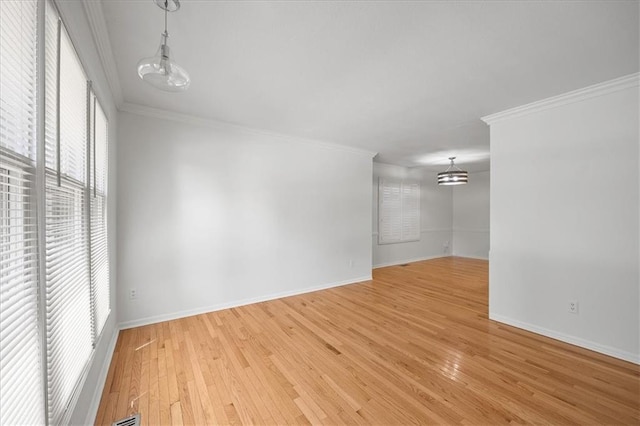 1467 E Orleans Dr, Olathe, KS 66062 - empty room with ornamental molding, light wood-type flooring, and a chandelier