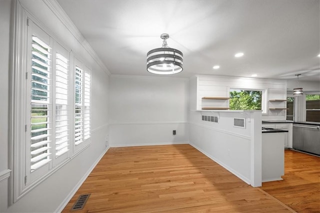1467 E Orleans Dr, Olathe, KS 66062 - unfurnished dining area featuring ornamental molding, a chandelier, light wood-style flooring, and recessed lighting