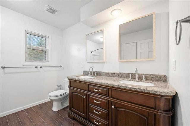 1467 E Orleans Dr, Olathe, KS 66062 - bathroom with double vanity and wood finished floors