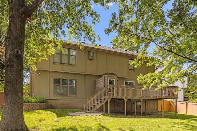 1467 E Orleans Dr, Olathe, KS 66062 - rear view of property featuring a wooden deck and stairway