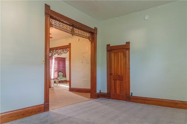 708 Osage St, Neodesha, KS 66757 - empty room featuring carpet flooring and a smoke detector