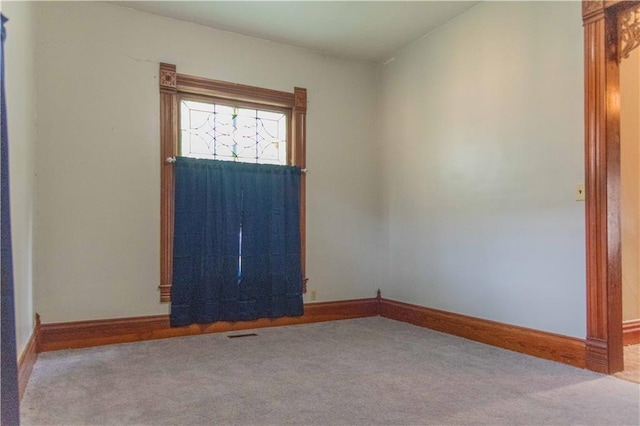 708 Osage St, Neodesha, KS 66757 - carpeted empty room featuring baseboards