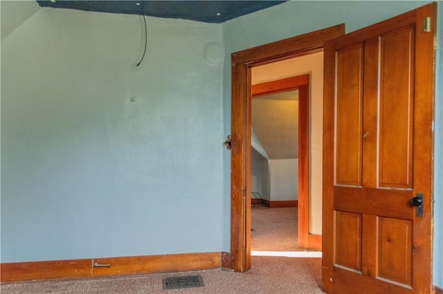 708 Osage St, Neodesha, KS 66757 - unfurnished room featuring carpet flooring and vaulted ceiling