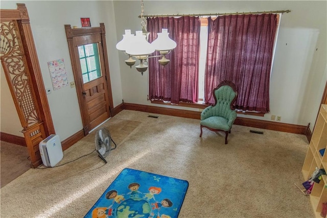 708 Osage St, Neodesha, KS 66757 - carpeted foyer featuring baseboards