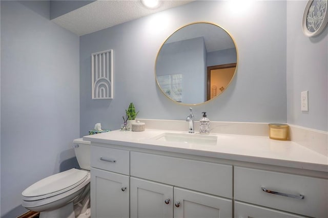 7103 Mastin St, Merriam, KS 66203 - bathroom featuring vanity and a textured ceiling