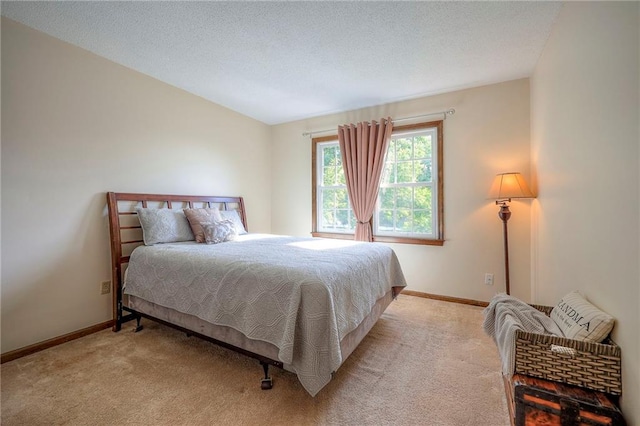 7103 Mastin St, Merriam, KS 66203 - bedroom featuring light colored carpet and a textured ceiling