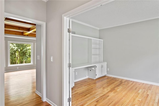 15614 Outlook St, Overland Park, KS 66223 - hallway featuring light wood-style floors and ornamental molding
