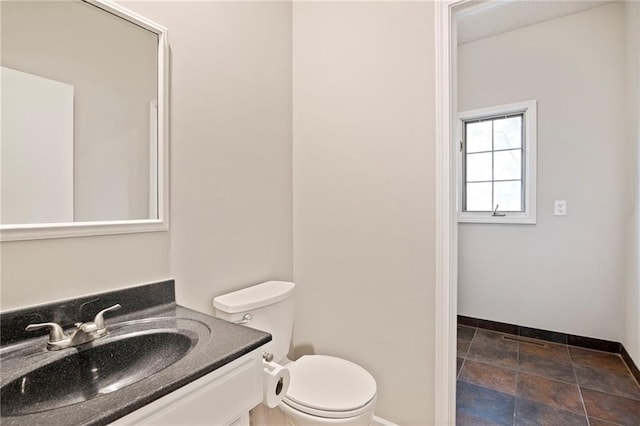 15614 Outlook St, Overland Park, KS 66223 - bathroom with vanity and stone finish flooring