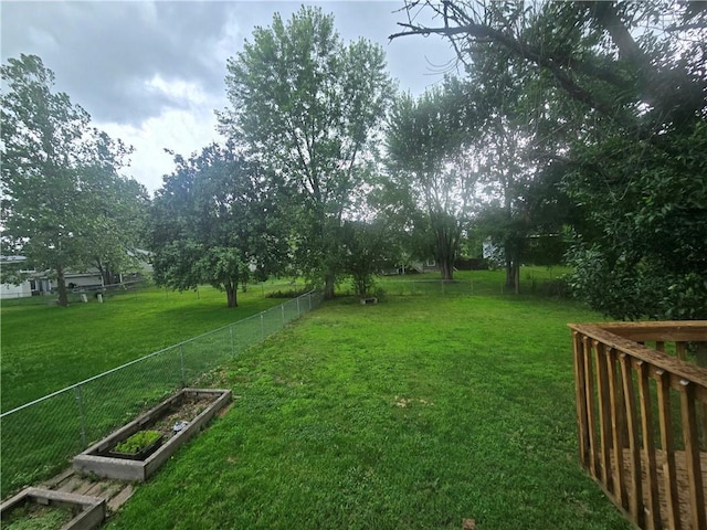 408 Creach St, Warrensburg, MO 64093 - view of yard featuring a vegetable garden