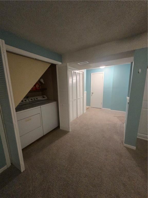 408 Creach St, Warrensburg, MO 64093 - hall featuring independent washer and dryer, carpet, and a textured ceiling