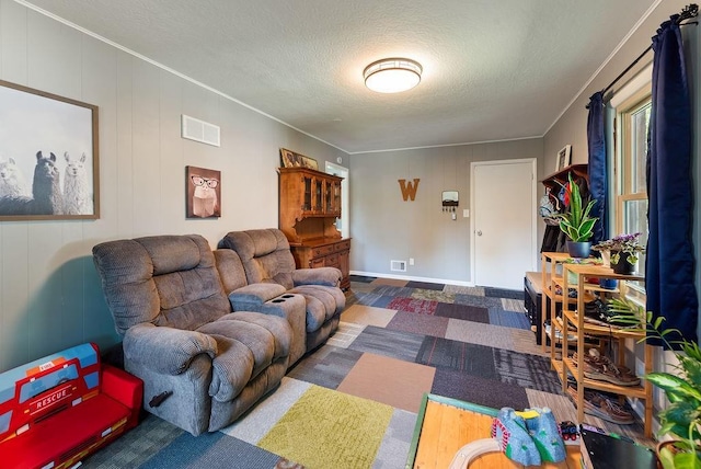 14224 E 36th St, Independence, MO 64055 - living area with ornamental molding, a textured ceiling, and wood finished floors