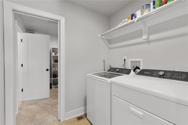 462 SE 90th Rd, Warrensburg, MO 64093 - laundry area featuring washing machine and dryer and light colored carpet