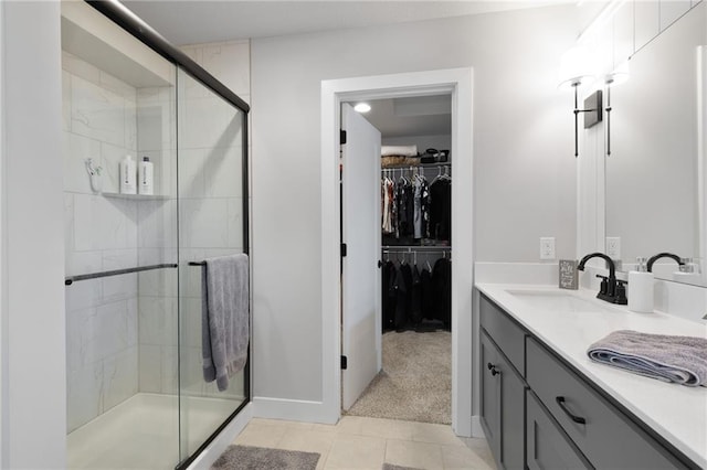 462 SE 90th Rd, Warrensburg, MO 64093 - full bath with vanity, a shower stall, a spacious closet, and tile patterned floors