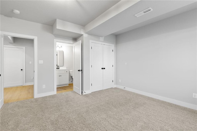 462 SE 90th Rd, Warrensburg, MO 64093 - unfurnished bedroom with light colored carpet and ensuite bath