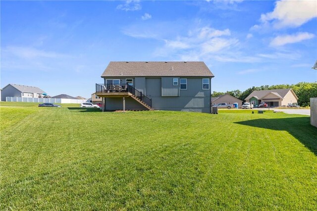 462 SE 90th Rd, Warrensburg, MO 64093 - rear view of property featuring stairway, a deck, a residential view, and a yard