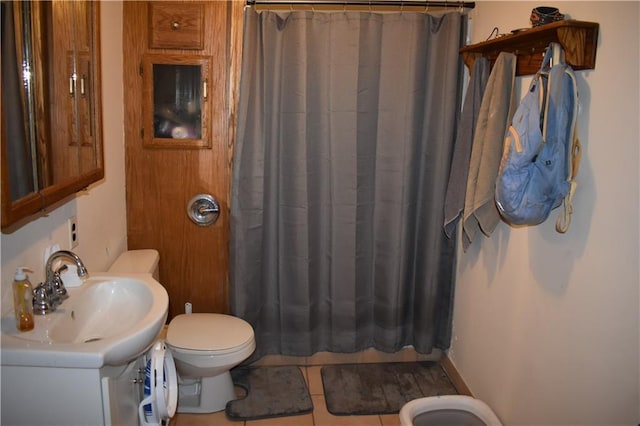 21570 Mclouth Rd, Mc Louth, KS 66054 - bathroom featuring tile patterned flooring, vanity, and a shower with curtain