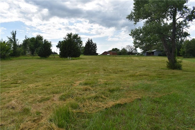 21570 Mclouth Rd, Mc Louth, KS 66054 - view of green lawn featuring a view of rural / pastoral area