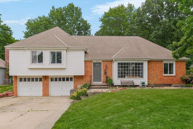 6305 N Bales Ave, Gladstone, MO 64119 - split level home featuring brick siding, concrete driveway, a garage, and a front yard