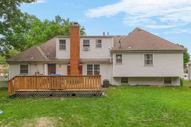 6305 N Bales Ave, Gladstone, MO 64119 - rear view of house featuring a chimney, a yard, a deck, and a shingled roof