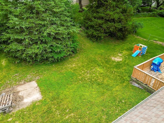 6305 N Bales Ave, Gladstone, MO 64119 - view of yard featuring a wooden deck