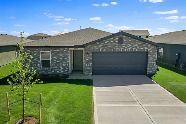 37770 W 207th Ter, Edgerton, KS 66021 - single story home with an attached garage, driveway, a front yard, and brick siding