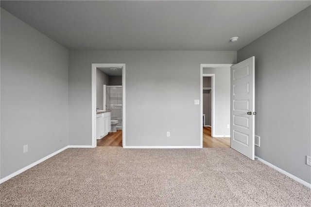 37770 W 207th Ter, Edgerton, KS 66021 - unfurnished bedroom with light colored carpet and connected bathroom