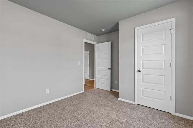 37770 W 207th Ter, Edgerton, KS 66021 - unfurnished bedroom featuring carpet floors and baseboards