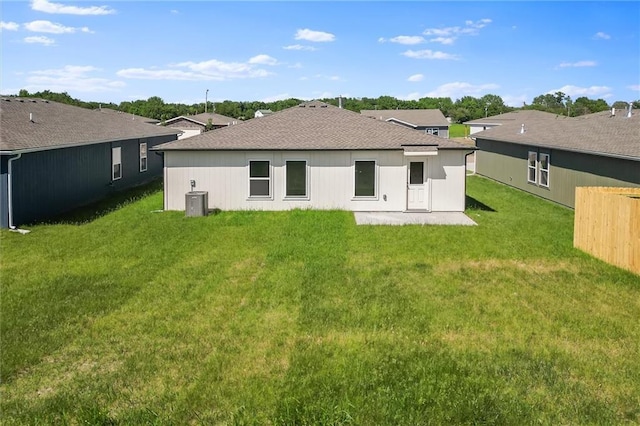 37770 W 207th Ter, Edgerton, KS 66021 - back of house with a yard and a shingled roof