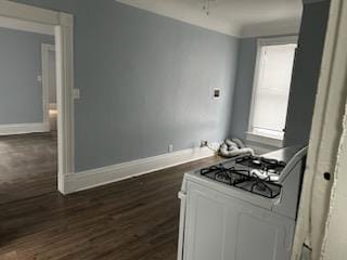 605 Hall St, Saint Joseph, MO 64501 - kitchen featuring white gas range oven and dark wood finished floors