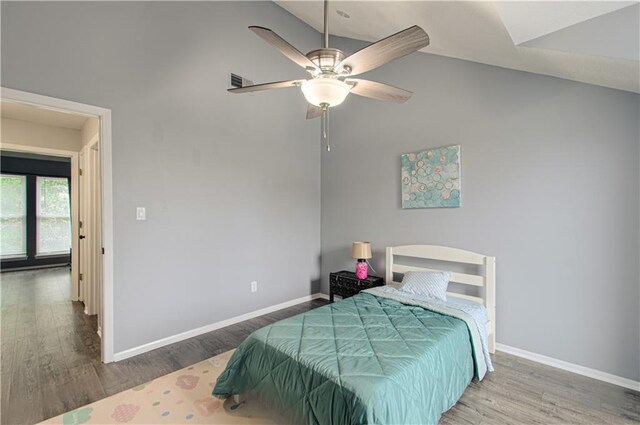 12131 W 82nd Ter, Lenexa, KS 66215 - bedroom featuring wood finished floors, high vaulted ceiling, and a ceiling fan