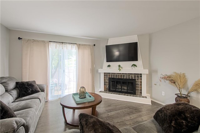 12131 W 82nd Ter, Lenexa, KS 66215 - living room with wood finished floors and a brick fireplace