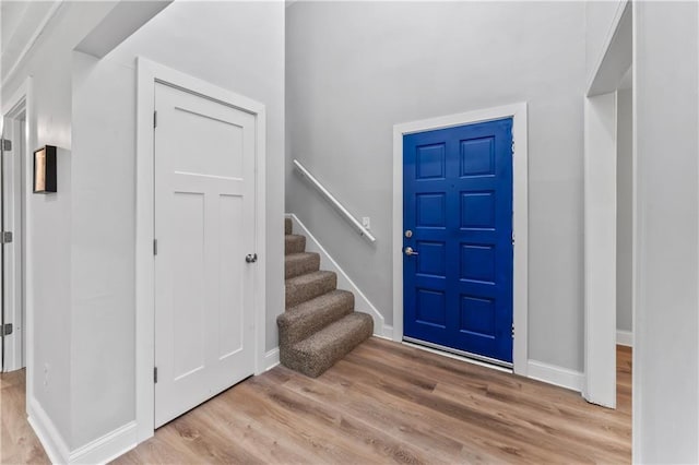 10312 W 48th Ter, Shawnee, KS 66203 - foyer with light wood finished floors and stairway
