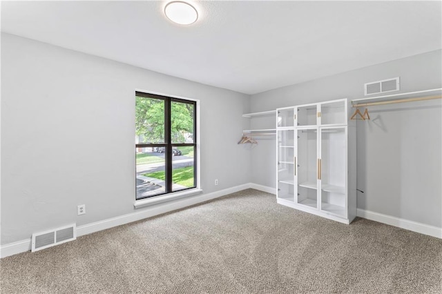 10312 W 48th Ter, Shawnee, KS 66203 - unfurnished bedroom with carpet flooring and a closet