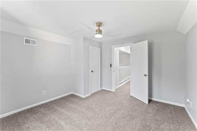 10312 W 48th Ter, Shawnee, KS 66203 - carpeted empty room with ceiling fan and lofted ceiling