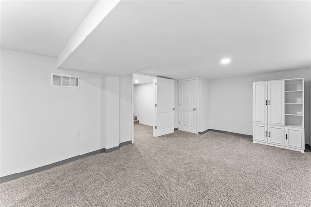 10312 W 48th Ter, Shawnee, KS 66203 - finished below grade area featuring carpet floors and recessed lighting
