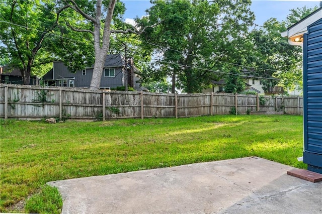 10312 W 48th Ter, Shawnee, KS 66203 - fenced backyard with a patio area