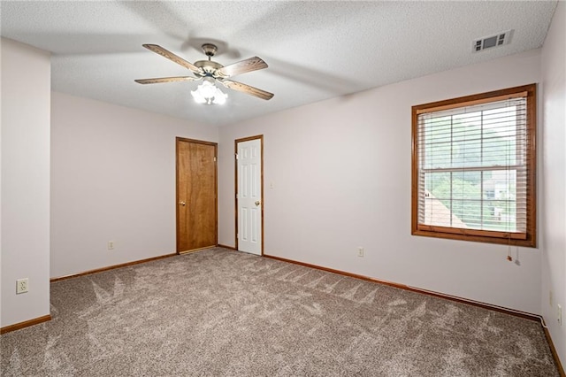 18807 E 34th St, Independence, MO 64057 - carpeted spare room featuring ceiling fan and a textured ceiling