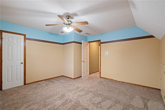 18807 E 34th St, Independence, MO 64057 - unfurnished bedroom with carpet flooring, a textured ceiling, and ceiling fan