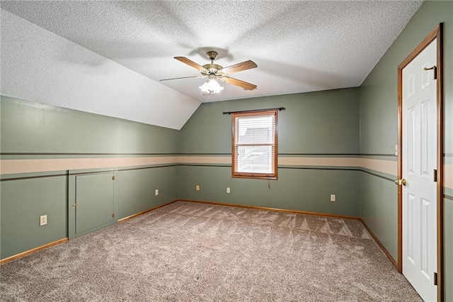18807 E 34th St, Independence, MO 64057 - bonus room with carpet floors, a ceiling fan, a textured ceiling, and vaulted ceiling