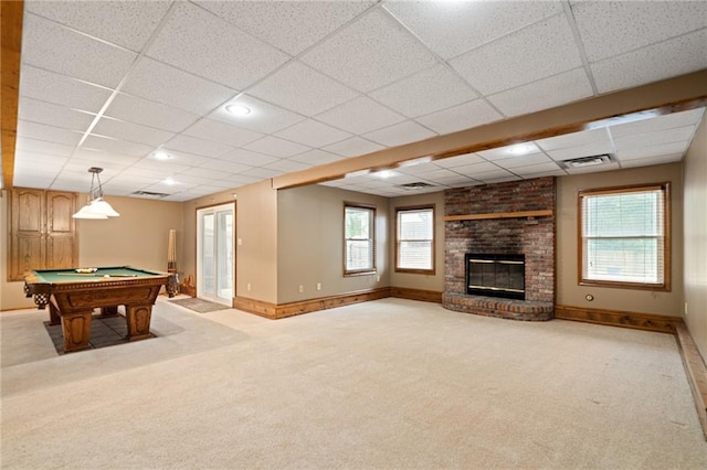 18807 E 34th St, Independence, MO 64057 - playroom featuring pool table, light carpet, a brick fireplace, and a paneled ceiling