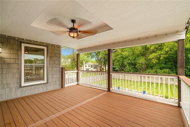 18807 E 34th St, Independence, MO 64057 - deck with a ceiling fan and a lawn