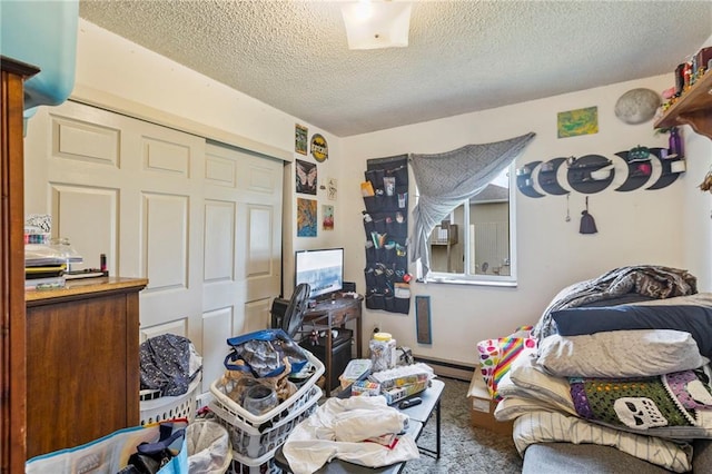 301-A N 3rd St, Odessa, MO 64076 - bedroom with a textured ceiling and a closet